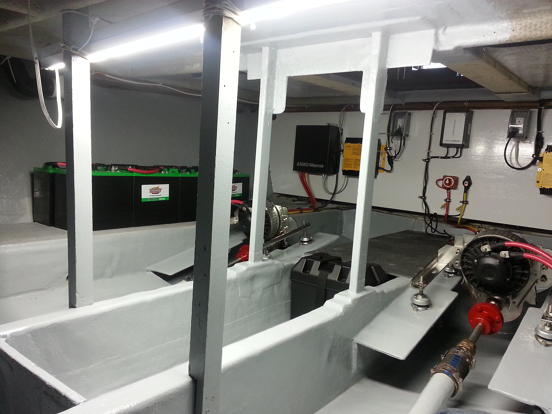 Battery bank in the bilge of an electrically converted 1973 Tollycraft